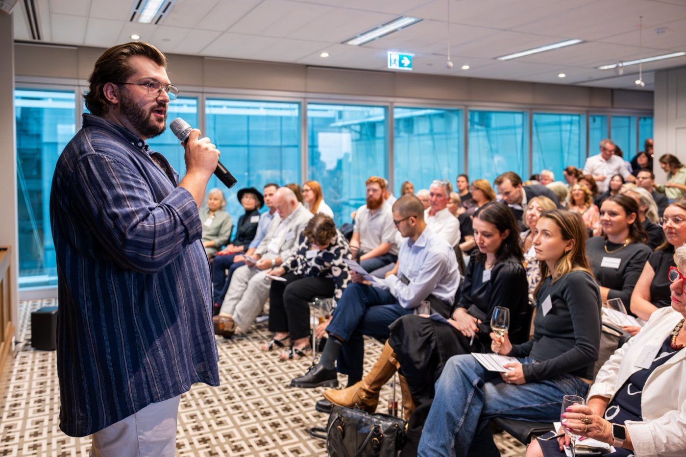 Rick Cohen taking questions from the audience at the pitch night